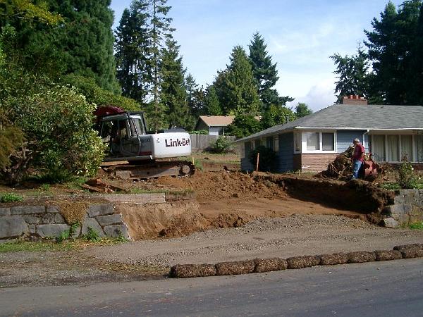 House 9.24.04 00000.JPG - New driveway being excavated. The overgrown and diseased Rhododendrons are removed.